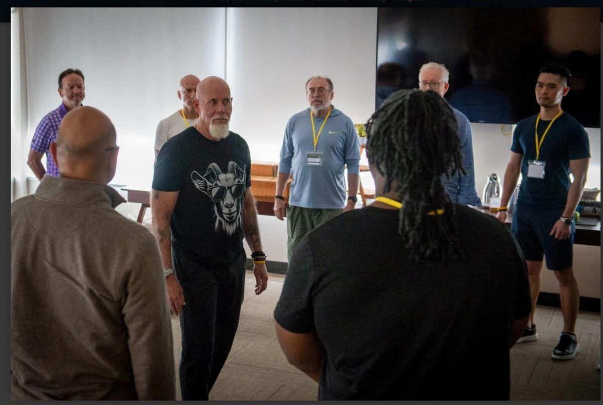 Dr. Robert Glover leading a TPI weekend workshop with a group of men